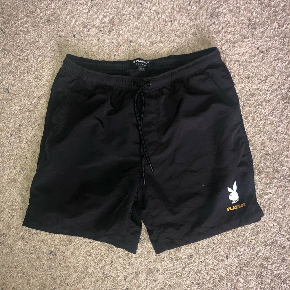 Black playboy swim trunks
